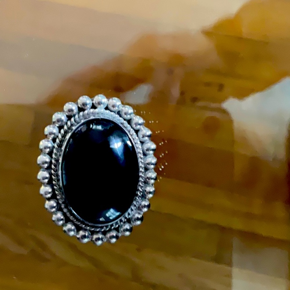 Women’s vintage silver brooch with black stone